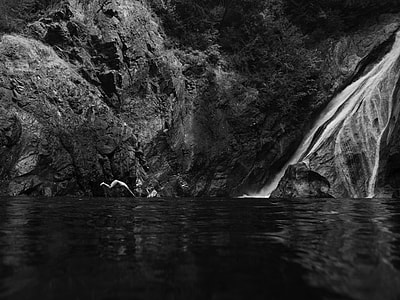 grayscale photography of waterfalls thumbnail