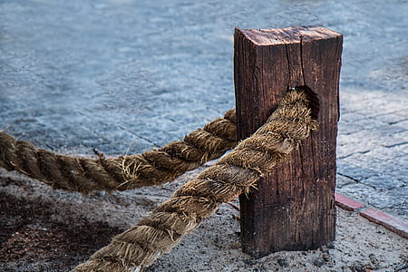 brown wooden rack with rope at daytime thumbnail