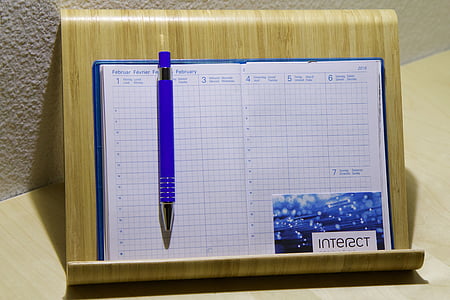 white book and click pen thumbnail