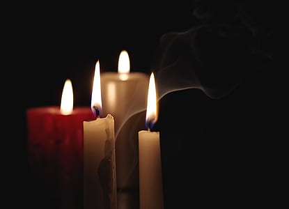 close up photography of lit candles in dimmed room thumbnail
