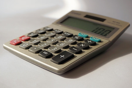 grey and black desktop calculator displaying 100 thumbnail