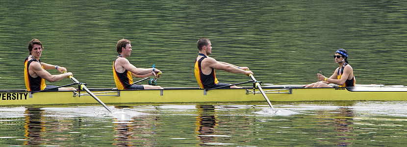four people riding on yellow canoe thumbnail