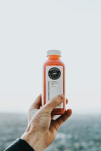 person holding Presseo bottle thumbnail