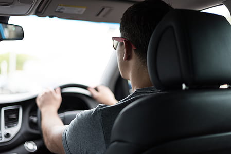 man driving car thumbnail