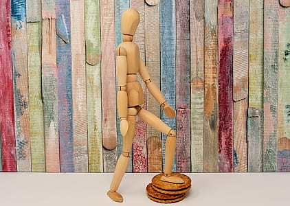 brown manikin in front of wall thumbnail