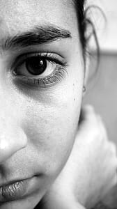 grayscale close up photo of a woman's face thumbnail