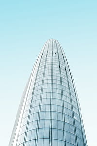 high rise building with glass windows thumbnail