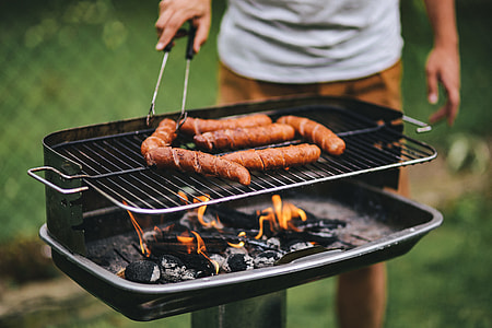 Pork and sausage on the grill thumbnail