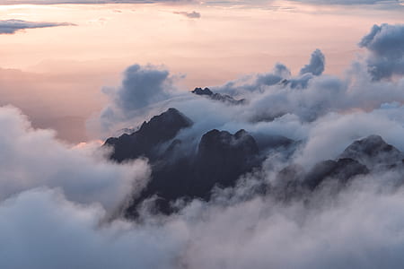 aerial view of mountain covered with clouds thumbnail