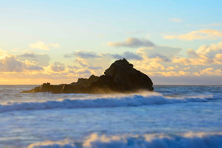 photo of sea wave during golden hour thumbnail