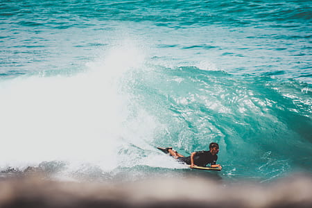 person riding surf board thumbnail