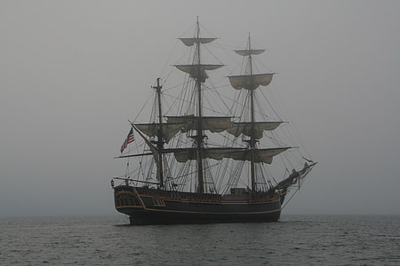 gray sail boat on water thumbnail