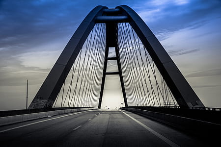 bridge under cloudy sky thumbnail