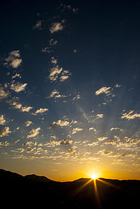 mountain and white clouds during sunrise photo thumbnail