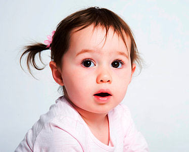 close-up photo of baby looking up thumbnail