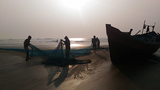 people standing near seashore at daytime thumbnail
