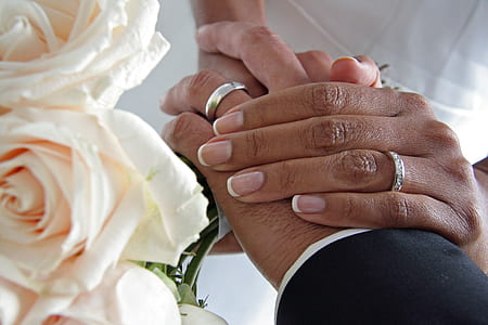 man and woman wearing band rings thumbnail