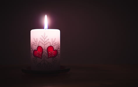 close-up photo of white lighted candle thumbnail