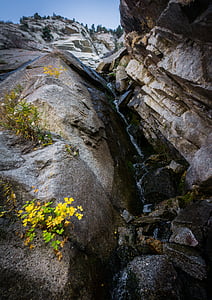 low angle photography of rocky cliff during daytime thumbnail