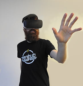 man wearing black VR headset close-up photo thumbnail