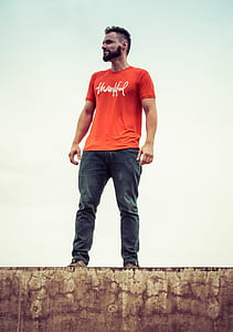 man standing on brown surface thumbnail