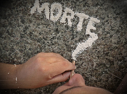 man near gray table with white morte powder thumbnail