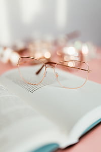Open book on a pink background thumbnail