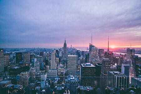 city view under white and blue sky during sunset thumbnail