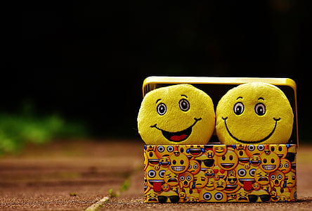 two yellow smile emoji pillows thumbnail