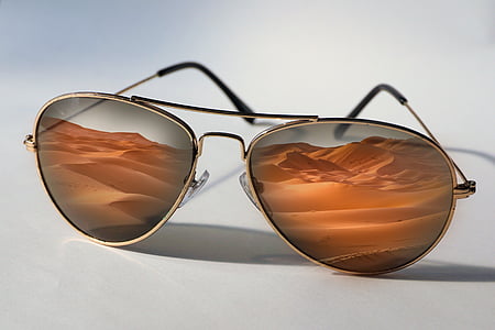 closeup photo of gray aviator-style sunglasses thumbnail