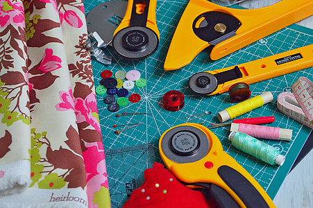 three pink, yellow, and teal threads thumbnail