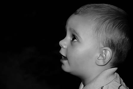 boy wearing polo shirt in grayscale photography thumbnail