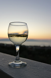 filled clear wine glass thumbnail