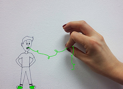 person holding string thumbnail