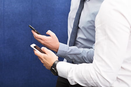Colleagues Using Cell Phones Photo thumbnail