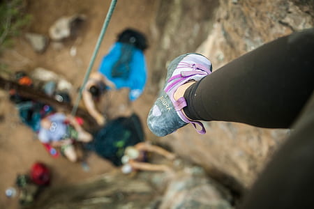 person showing gray and purple shoe thumbnail