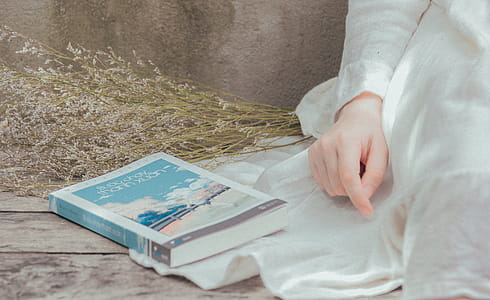 Title Book on White Textile thumbnail