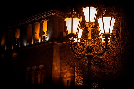 5-lighted lamp near brown concrete structure thumbnail