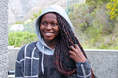 woman wearing gray and white pullover hoodie thumbnail