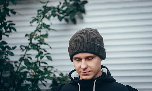 man wearing black bonnet thumbnail