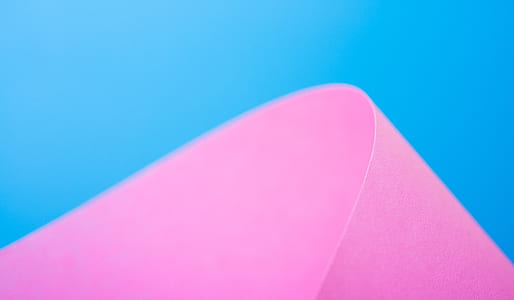 pink paper against blue background thumbnail