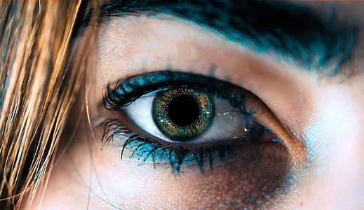 woman right eye with blue eyeliner thumbnail