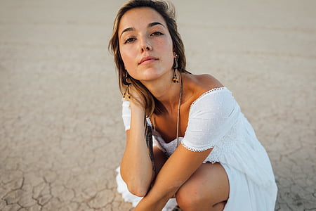 woman in white dress thumbnail