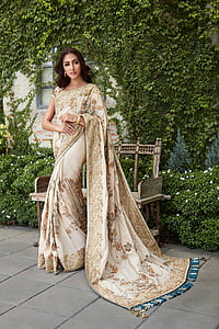 woman in brown floral sari traditional dress thumbnail