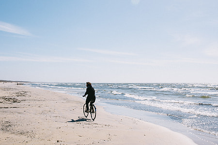 Girl, bike and sea thumbnail