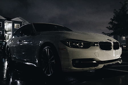 close-up photo of white BMW 3-series sedan thumbnail