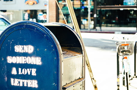 blue and gray metal garbage can thumbnail