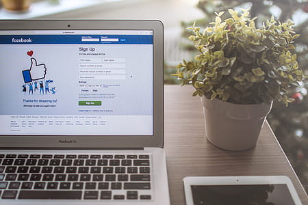 Laptop with a login page on facebook in the home office thumbnail