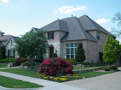 gray concrete house with garden trees thumbnail