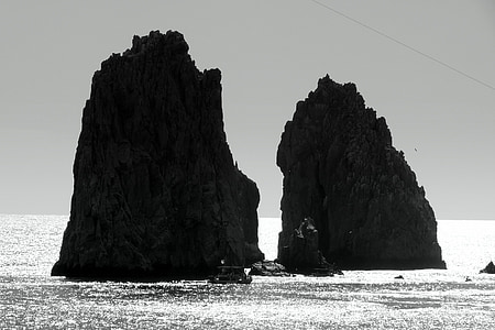 two rock formations in ocean thumbnail